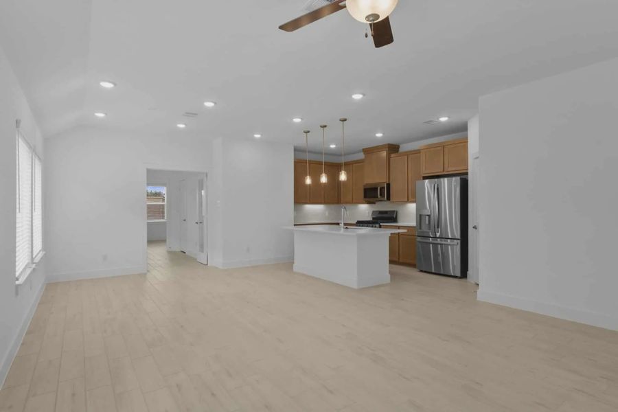 Representative unfurnished interior of a home built from the Chalet by Chesmar Homes in Meridiana Townhomes, Iowa Colony (Image 20).