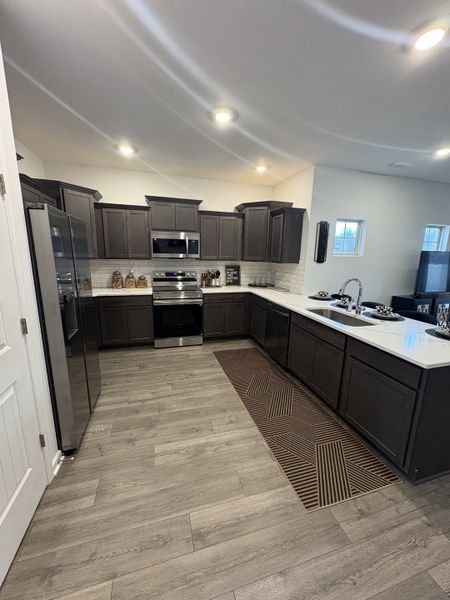 Photo is of the model home to show what the completed floor plan looks like. Selections and Options may vary.