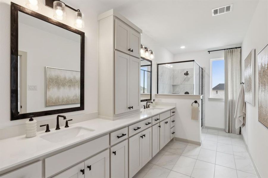 Filled with style, sophistication and space, this fantastic owner's bath was built for two!