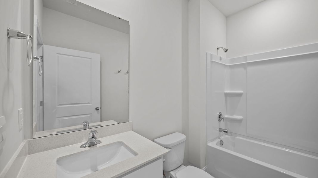 Furnished interior view inside a new home in Villa Grande, Winterville (Image 9).