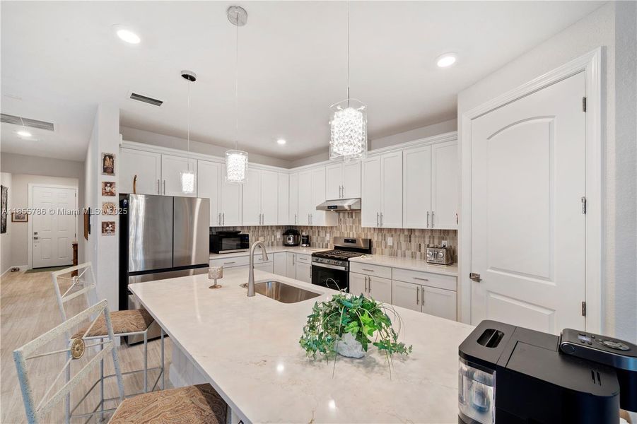 Furnished interior view inside a new home in Del Webb Tradition, Port St. Lucie (Image 30).