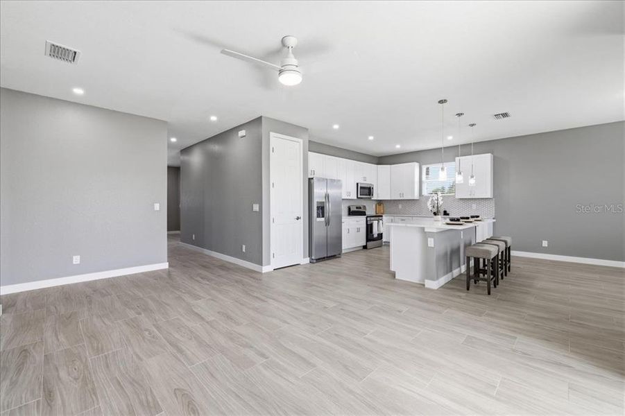 Furnished interior view inside a new home in , North Port (Image 11).