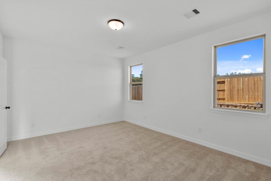 Spacious, unfurnished interior of a new home in Spring Creek Trails, Magnolia (Image 16).