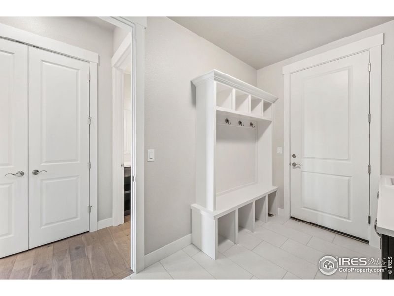 Mudroom/laundry is a functional organized space, just off the garage.