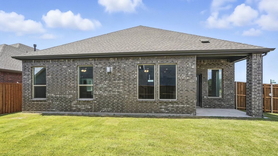 Representative exterior photo of a completed home built from the Ivery by D.R. Horton in Madera, Royse City, TX (Image 21).