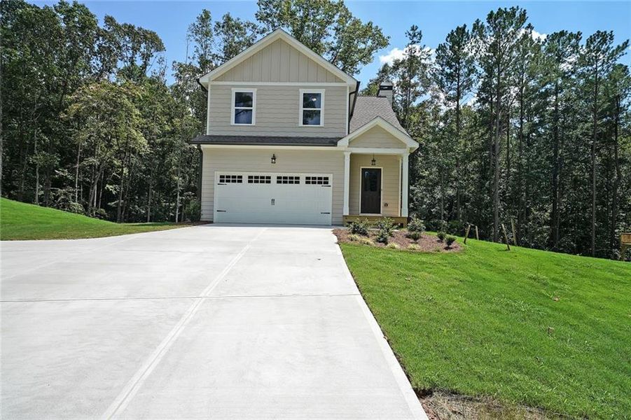 Front exterior of a new home in , Dahlonega, GA, highlighting curb appeal (Image 1).