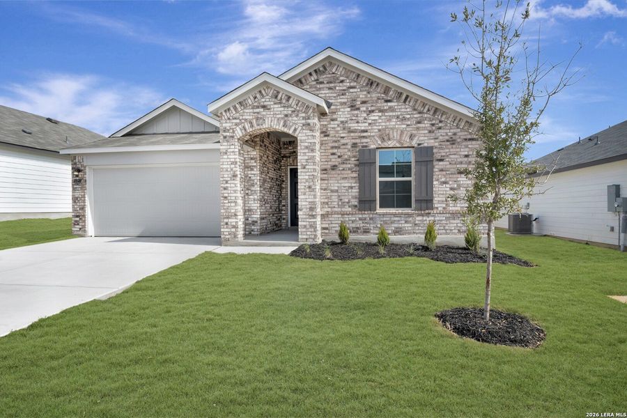 Front exterior of a new home in Greenspoint Heights, Seguin, TX, highlighting curb appeal (Image 18).