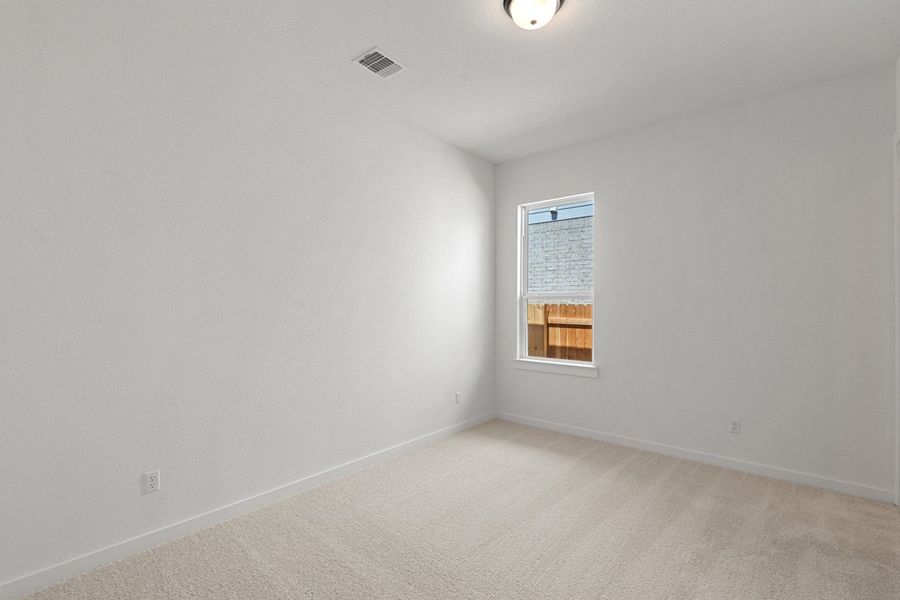 Spacious, unfurnished interior of a new home in Capitol Collection at Lariat, Liberty Hill (Image 39).