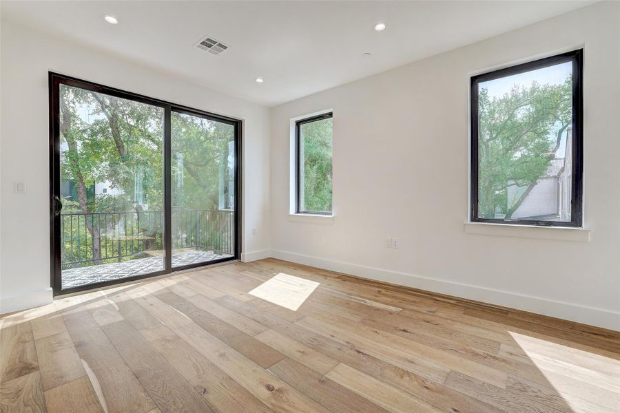Unfurnished room featuring light wood-style floors and recessed lighting