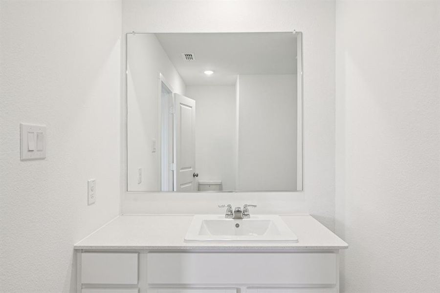 Bathroom featuring vanity Bathroom featuring vanity