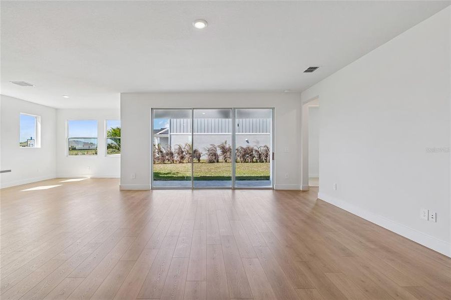 Spacious, unfurnished interior of a new home in Coasterra, Palmetto (Image 44).
