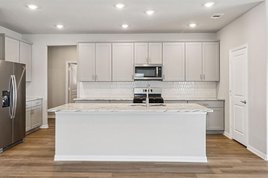 Photo is not of the actual home, but is an inspirational photo of builder’s model home and may depict options, furnishings, and/or decorator features that are not included.