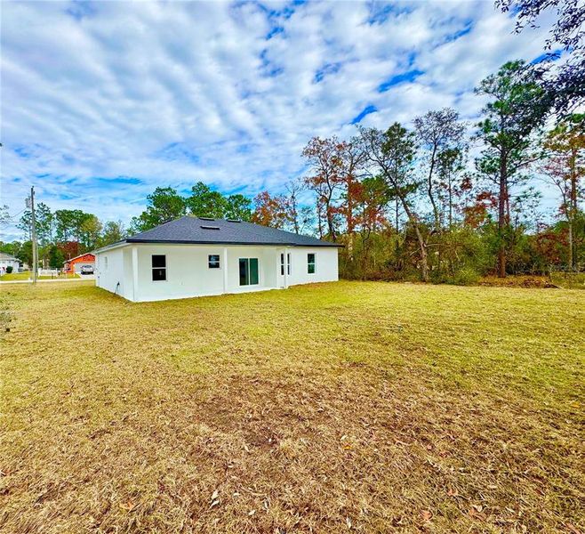 Exterior details and patio area of a home in , Citrus Springs (Image 20).