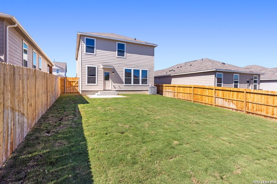 Exterior details and patio area of a home in Knox Ridge, Converse (Image 22).