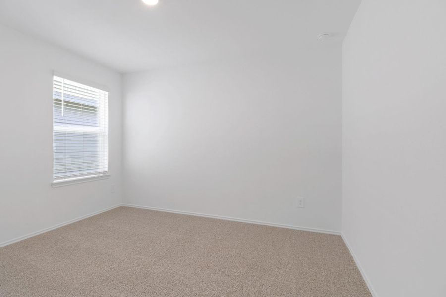 Spacious, unfurnished interior of a new home in Grand Pines, Magnolia (Image 9).
