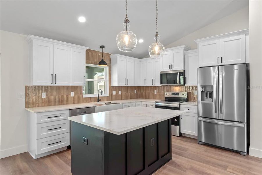 Furnished interior view inside a new home in , Dunnellon (Image 11).