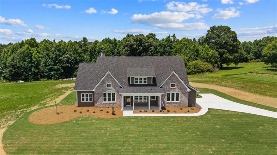 Front exterior of a new home in , Roopville, GA, highlighting curb appeal (Image 29).