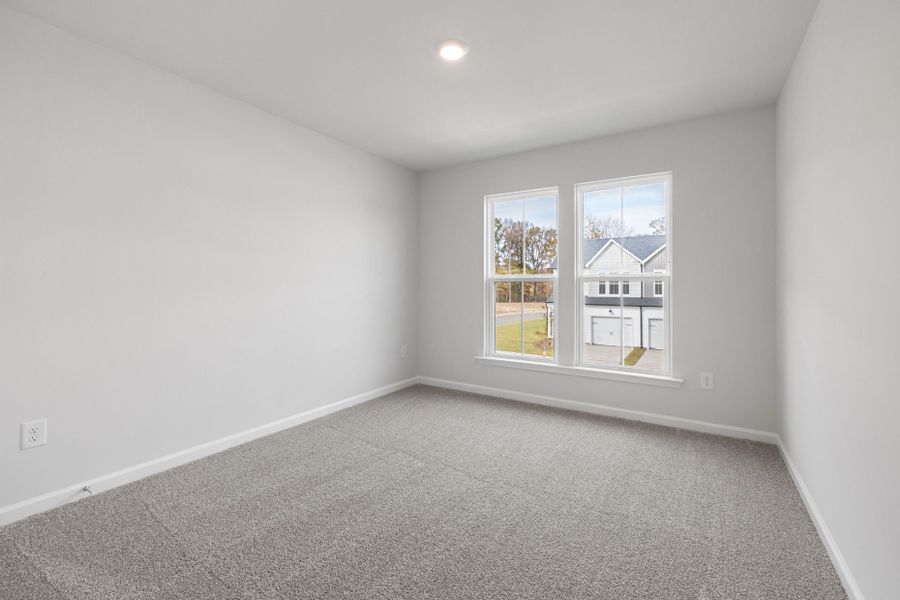 Spacious, unfurnished interior of a new home in Poets Walk, Whitsett (Image 16).