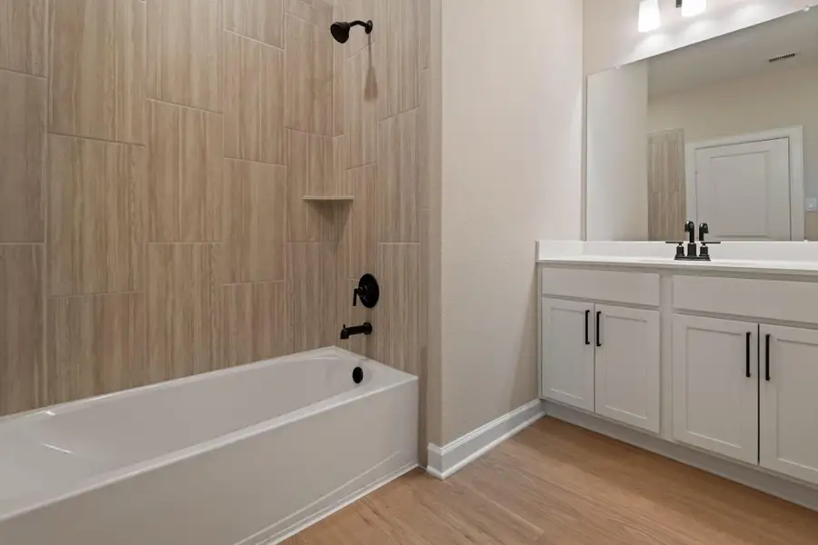 Furnished interior view inside a new home in Magnolia Woods, Magnolia (Image 9). Furnished interior view inside a new home in Magnolia Woods, Magnolia (Image 9).