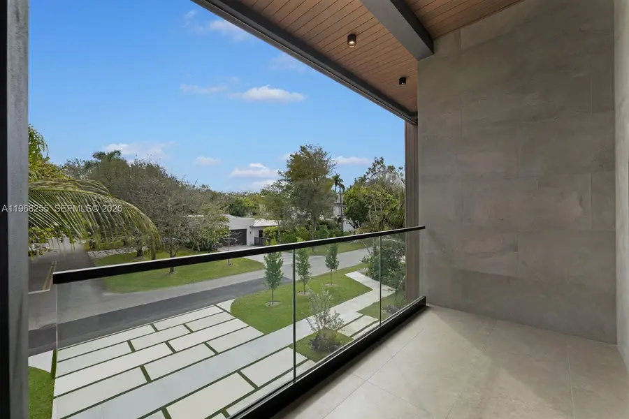 Exterior details and patio area of a home in , Miami (Image 4).