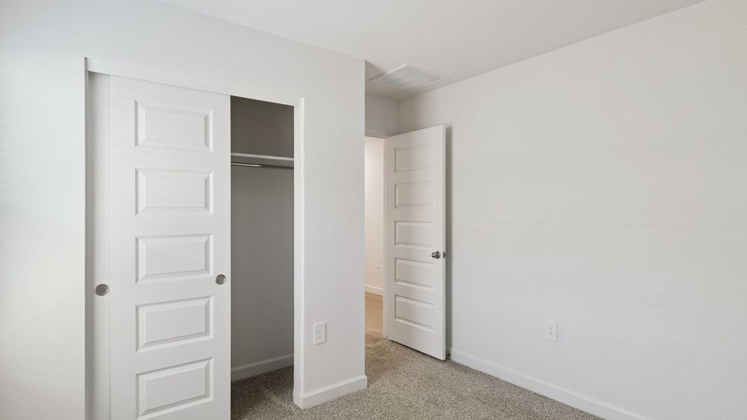 Representative unfurnished interior of a home built from the Gaven by D.R. Horton in The Ridge at Stone Butte, Phoenix (Image 17).