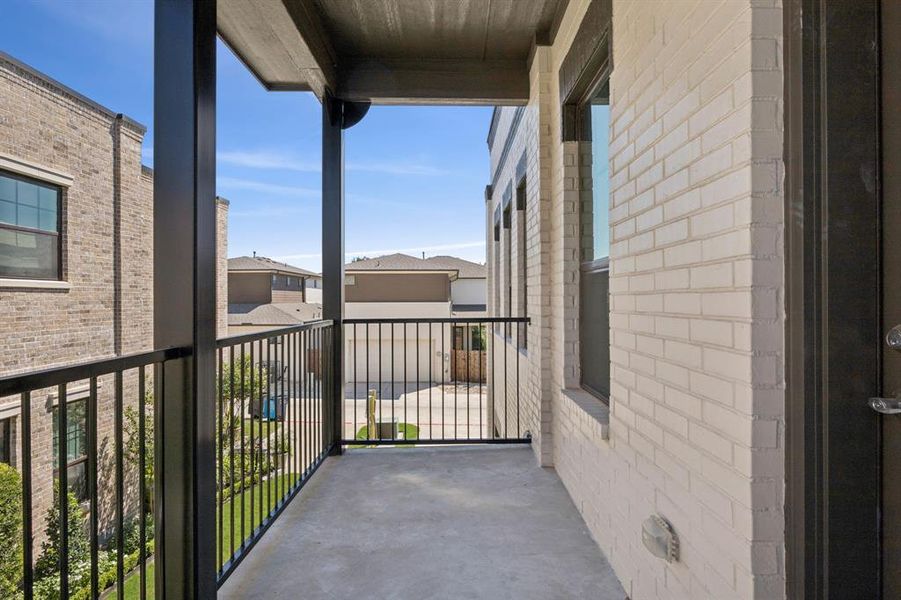 View of balcony off of secondary bedroom.