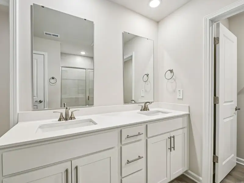 Furnished interior view inside a new home in Oak Manor - Classic Series, Garner (Image 4). Furnished interior view inside a new home in Oak Manor - Classic Series, Garner (Image 4).