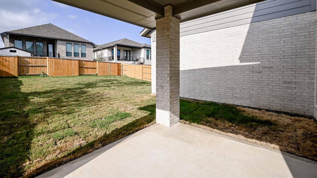Exterior details and patio area of a home in 6 Creeks, Kyle (Image 3).