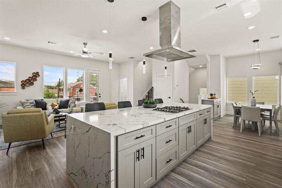 Modern culinary haven featuring sleek quartz countertops and state-of-the-art stainless steel appliances. A perfect blend of elegance and functionality