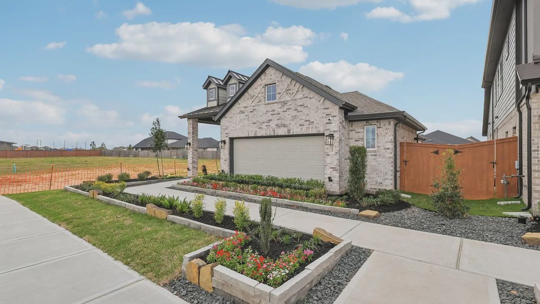 Representative exterior photo of a completed home built from the Adele by Chesmar Homes in Elyson 60's, Katy, TX (Image 20).