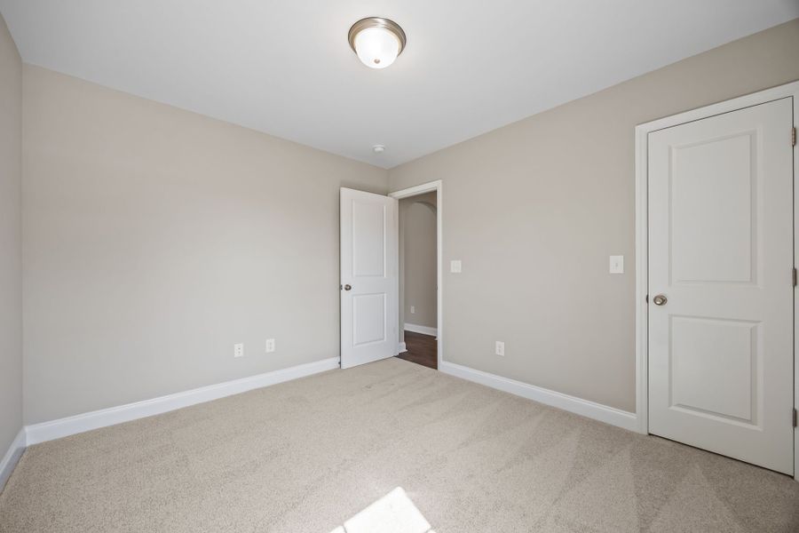 Spacious, unfurnished interior of a new home in Davenport Farms, Winterville (Image 33).