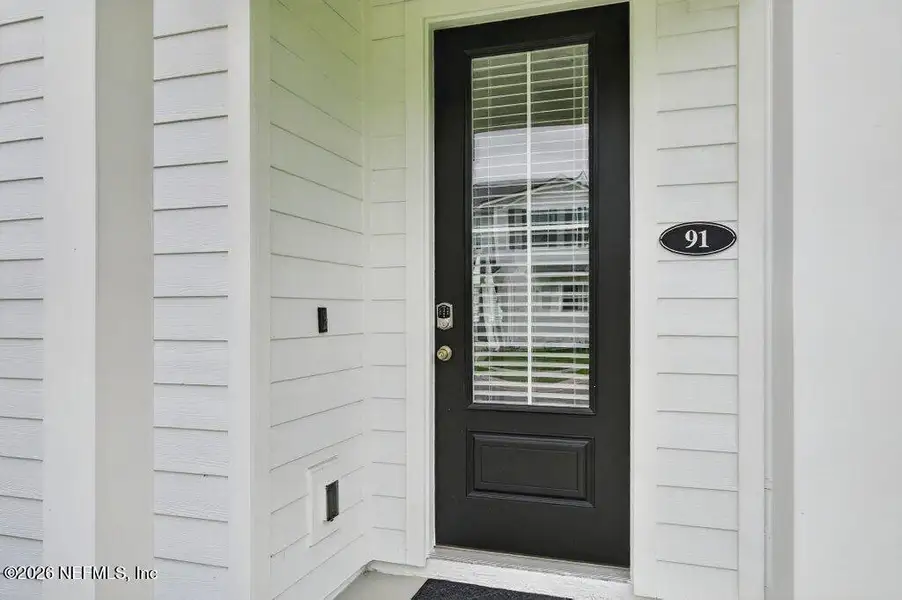 Exterior details and patio area of a home in , St. Johns (Image 23).