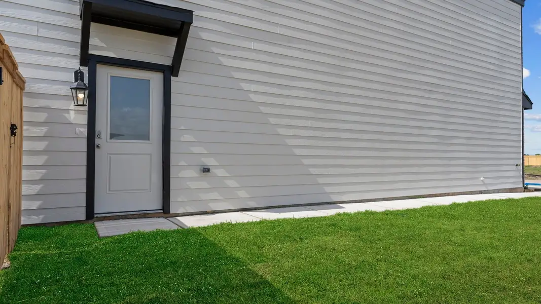 Exterior details and patio area of a home in Lexington Village, Missouri City (Image 2). Exterior details and patio area of a home in Lexington Village, Missouri City (Image 2).