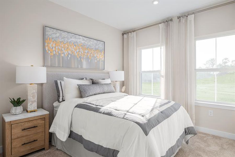 Representative furnished interior of a home built from the Sonata by Ryan Homes in Townes at The Station, Apex (Image 15). Representative furnished interior of a home built from the Sonata by Ryan Homes in Townes at The Station, Apex (Image 15).