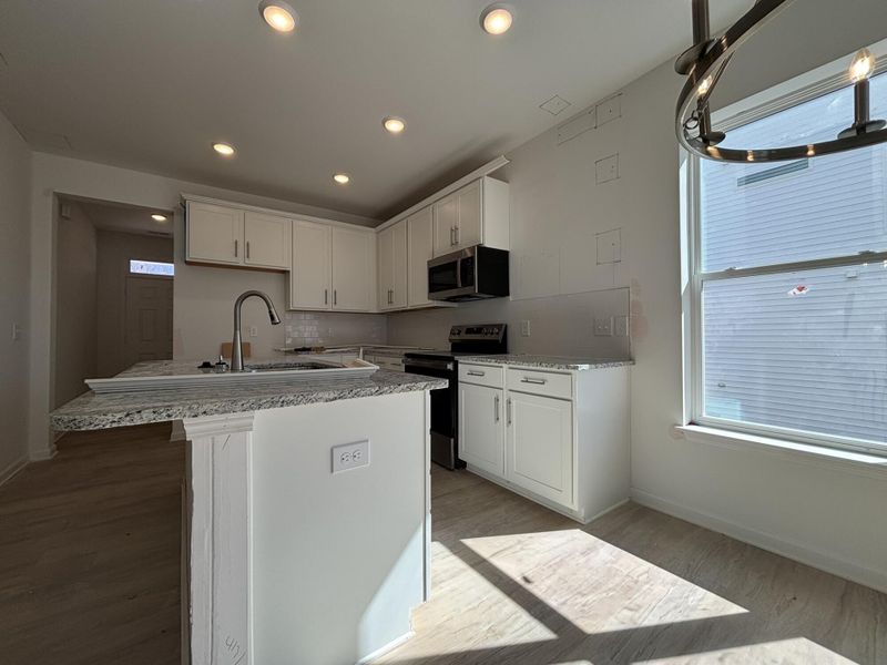 Furnished interior view inside a new home in CraigStone, Woodruff (Image 5). Furnished interior view inside a new home in CraigStone, Woodruff (Image 5).