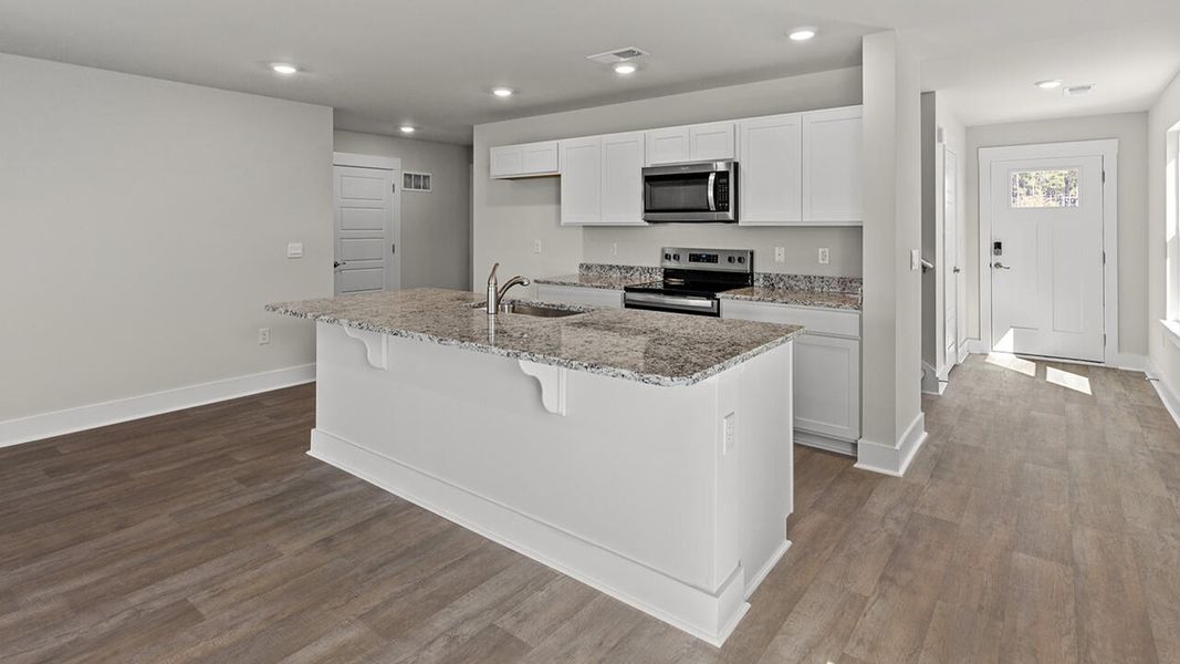 Furnished interior view inside a new home in Sidbury Station, Castle Hayne (Image 5).