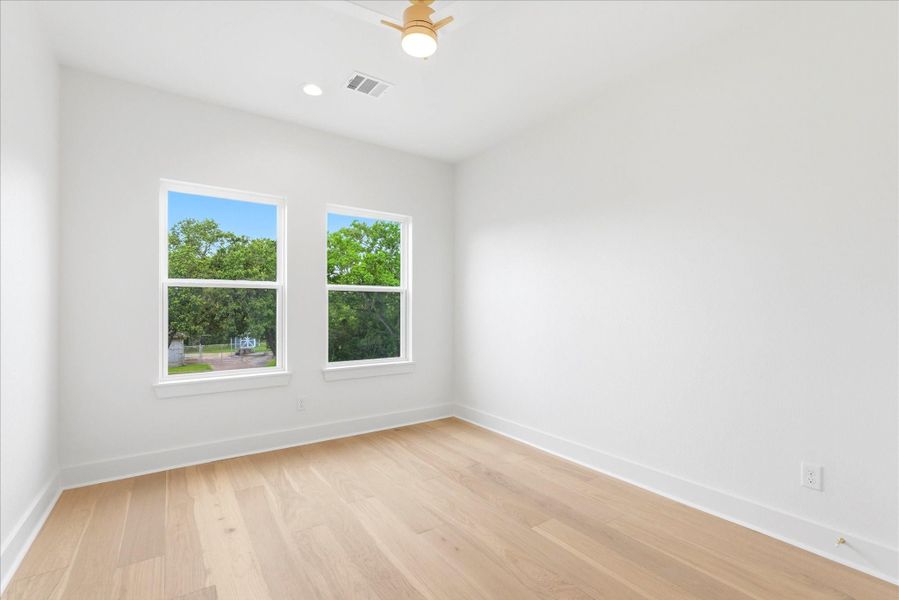 Each upstairs bedroom offers recessed lighting, a ceiling fan and a spacious closet.