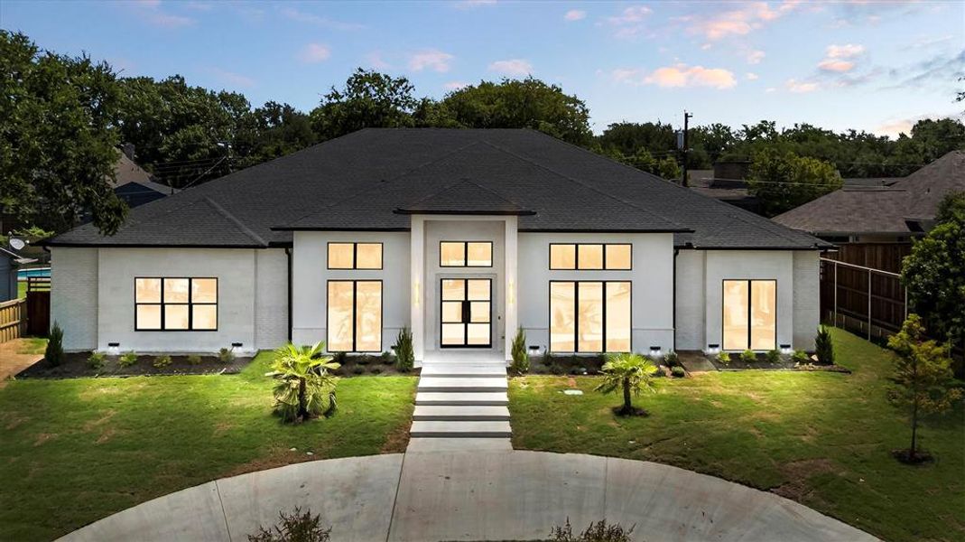 Front exterior of a new home in , Dallas, TX, highlighting curb appeal (Image 25).