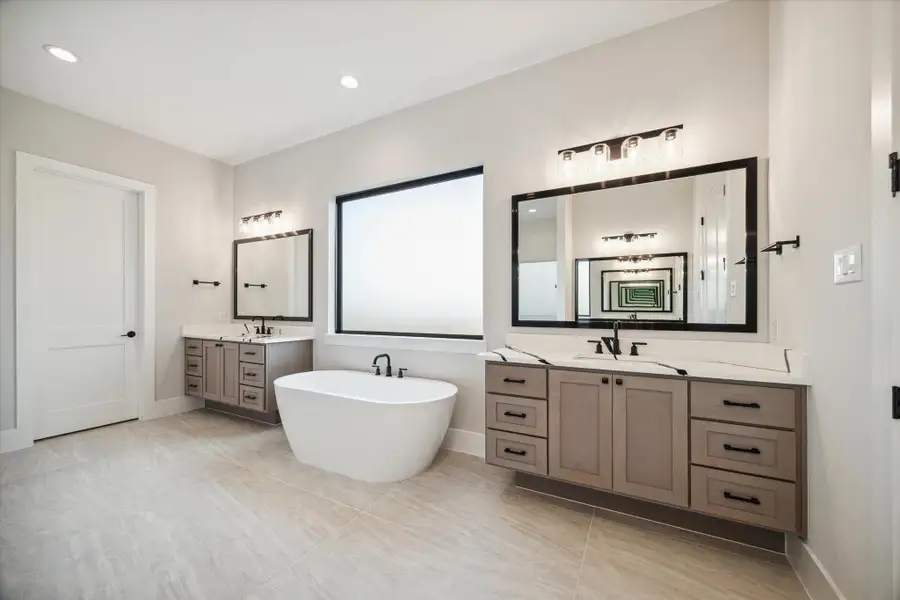 Furnished interior view inside a new home in Sienna - Estates at Summerhouse Lake, Missouri City (Image 5).