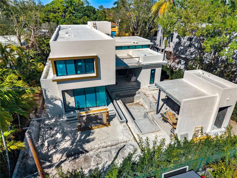 Front exterior of a new home in , Biscayne Park, FL, highlighting curb appeal (Image 7). Front exterior of a new home in , Biscayne Park, FL, highlighting curb appeal (Image 7).