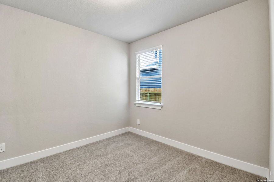 Spacious, unfurnished interior of a new home in Estancia Ranch - Premier Series, San Antonio (Image 17).