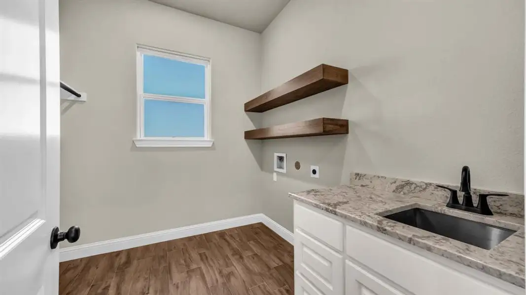 Furnished interior view inside a new home in , Poolville (Image 4).