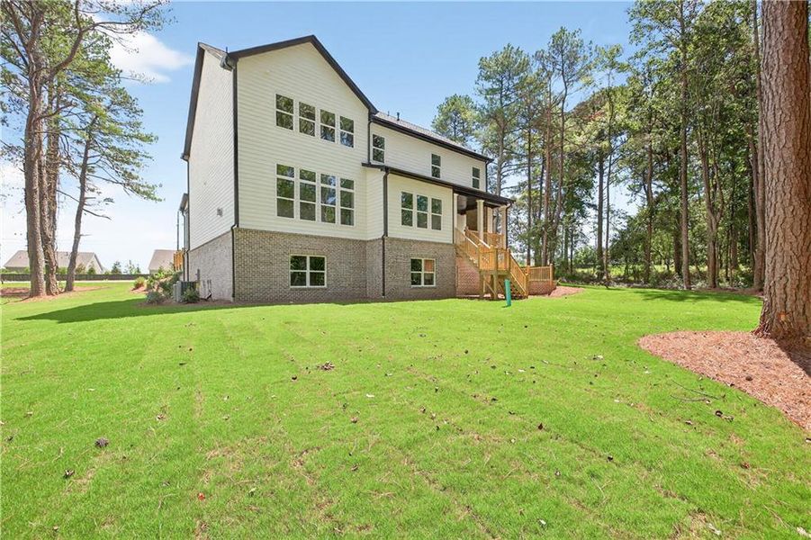 Front exterior of a new home in , Cumming, GA, highlighting curb appeal (Image 27). Front exterior of a new home in , Cumming, GA, highlighting curb appeal (Image 27).