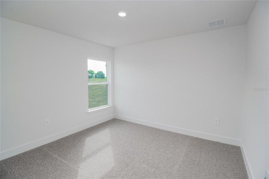 Spacious, unfurnished interior of a new home in Hickory Ridge Estates, Lake Wales (Image 27).