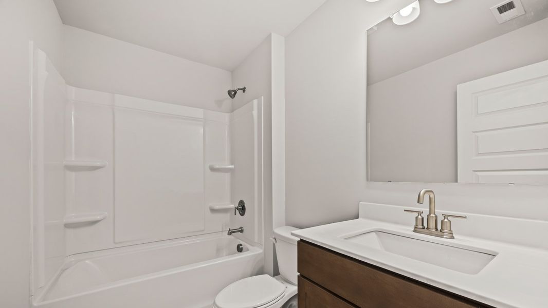 Representative furnished interior of a home built from the Summit by D.R. Horton in Heritage Pointe, Senoia (Image 10).