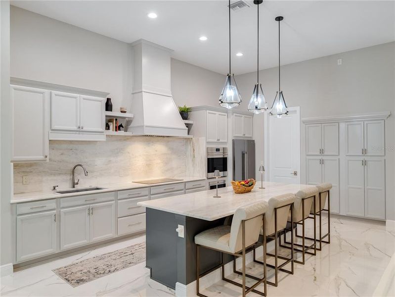 Kitchen with entrance to laundry and garage