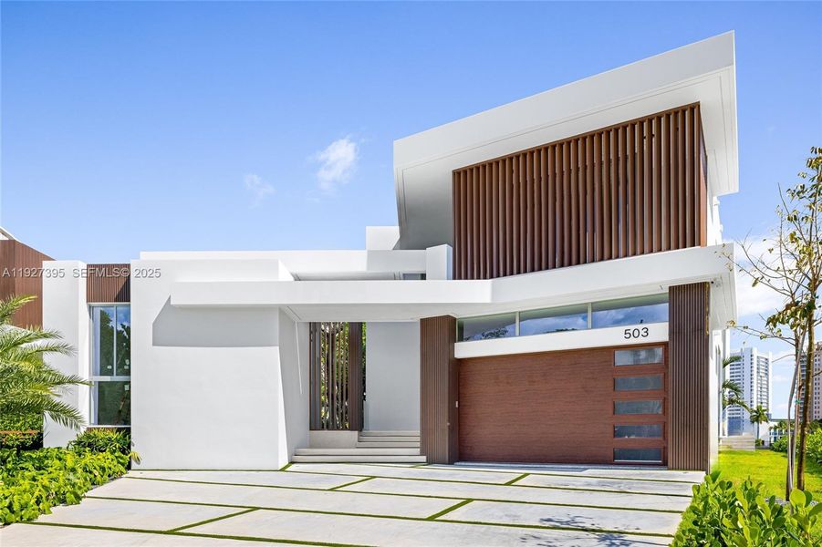 Front exterior of a new home in , Hallandale Beach, FL, highlighting curb appeal (Image 2).