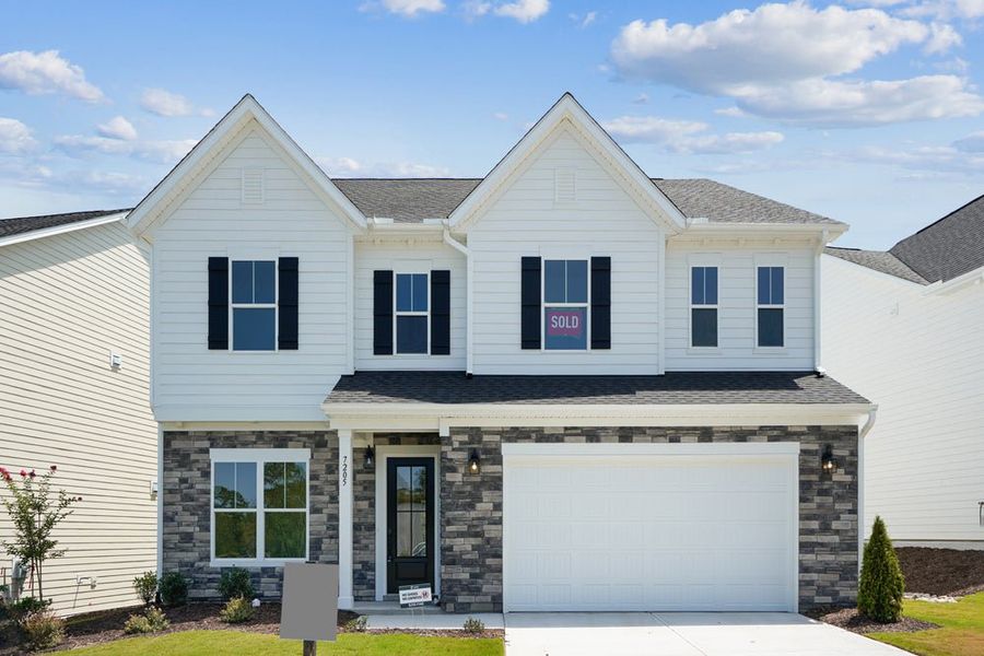 Representative exterior photo of a completed home built from the Lure by Caruso Homes in Blue Run, Raleigh, NC (Image 1). Representative exterior photo of a completed home built from the Lure by Caruso Homes in Blue Run, Raleigh, NC (Image 1).