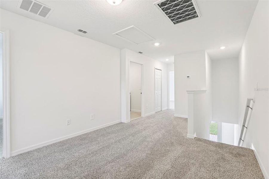 Spacious, unfurnished interior of a new home in The Meadow at Crossprairie Townes, St. Cloud (Image 22).