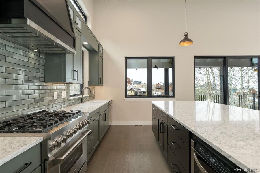 6-burner gas range and all stainless steel appliances